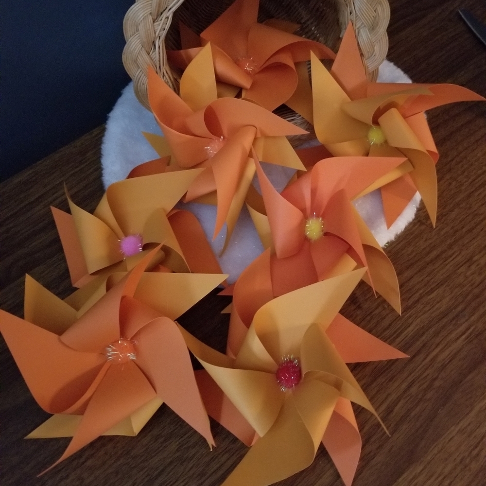 Bundle of (7) Handmade pinwheels w/colored pom poms.